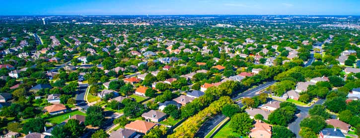 Aerial view of a neighborhood and city